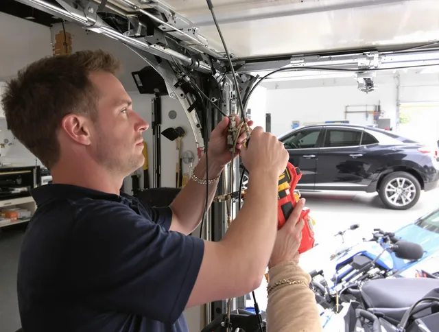 Country Club Garage Door Repair safety certified technician performing cable replacement in Country Club