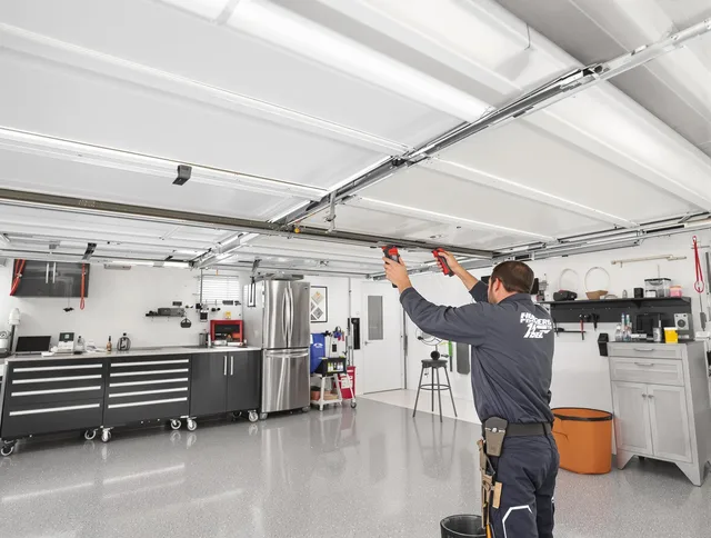 Overhead garage door repair service by Country Club Garage Door Repair in Country Club