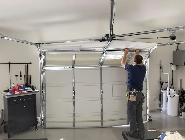 Country Club Garage Door Repair specialist performing precise section replacement on Country Club garage door