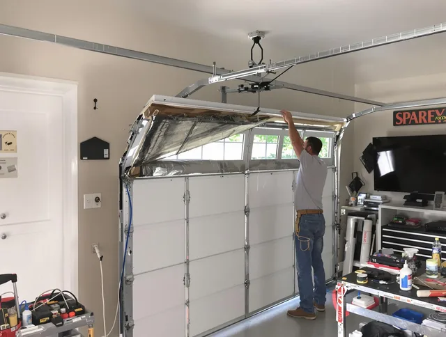 Garage door section replacement by Country Club Garage Door Repair in Country Club